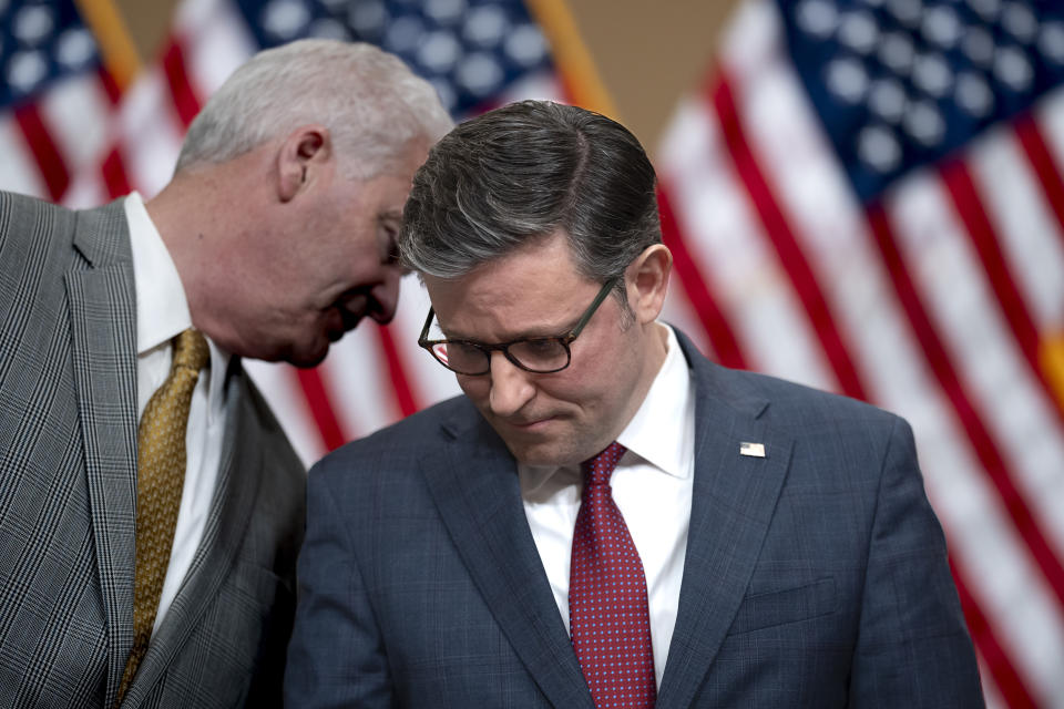 Speaker of the House Mike Johnson, R-La., right, confers with Majority Whip Tom Emmer, R-Minn., during a news conference ahead of the State of the Union address, at the Capitol in Washington, Wednesday, March 6, 2024. (AP Photo/J. Scott Applewhite)