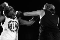 <p>Deirdre McDermott connects with a left across the chin of Tasha Mathews during the Brooklyn Smoker in the parking lot of Gargiulo’s Italian restaurant in Coney Island, Brooklyn, on Aug. 24, 2017. (Photo: Gordon Donovan/Yahoo News) </p>