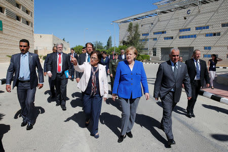 German Chancellor Angela Merkel visits the German Jordanian University near Madaba, Jordan June 21, 2018. REUTERS/Muhammad Hamed