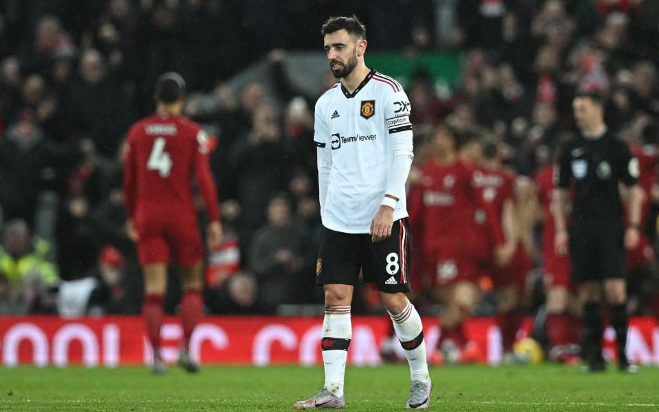 Manchester United's Portuguese midfielder Bruno Fernandes reacts after they concede their sixth goal during the English Premier League football match between Liverpool and Manchester United at Anfield - Bruno Fernandes, Manchester United's second half 'super brat' - Paul Ellis /Getty Images