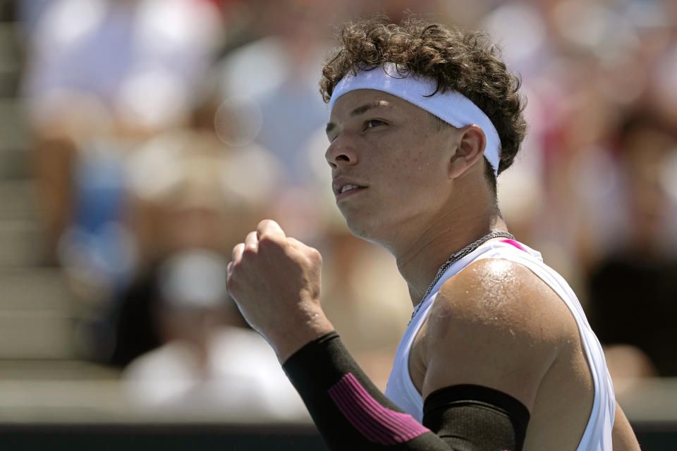 Ben Shelton of the U.S. reacts after winning a point against Roberto Bautista Agut of Spain during their first round match at the Australian Open tennis championships at Melbourne Park, Melbourne, Australia, Monday, Jan. 15, 2024. (AP Photo/Alessandra Tarantino)