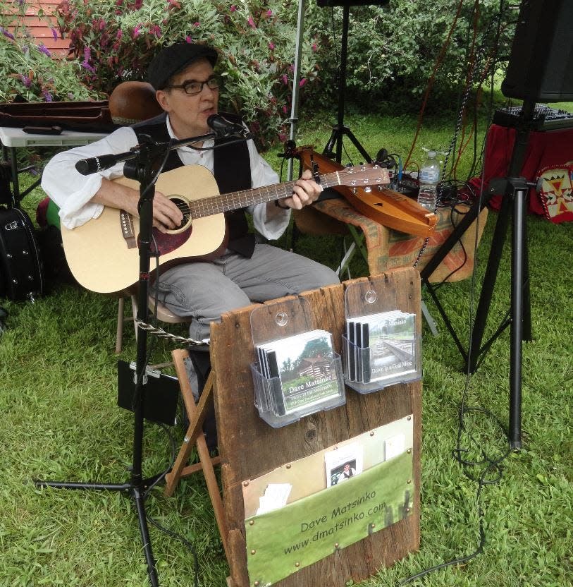 Dave Matsinko, "Minstrel of the Mountains," provides traditional folk and American heritage music at the Canal Festival.