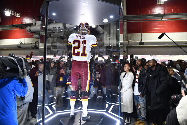 A Washington Commanders jersey is displayed at an event to unveil