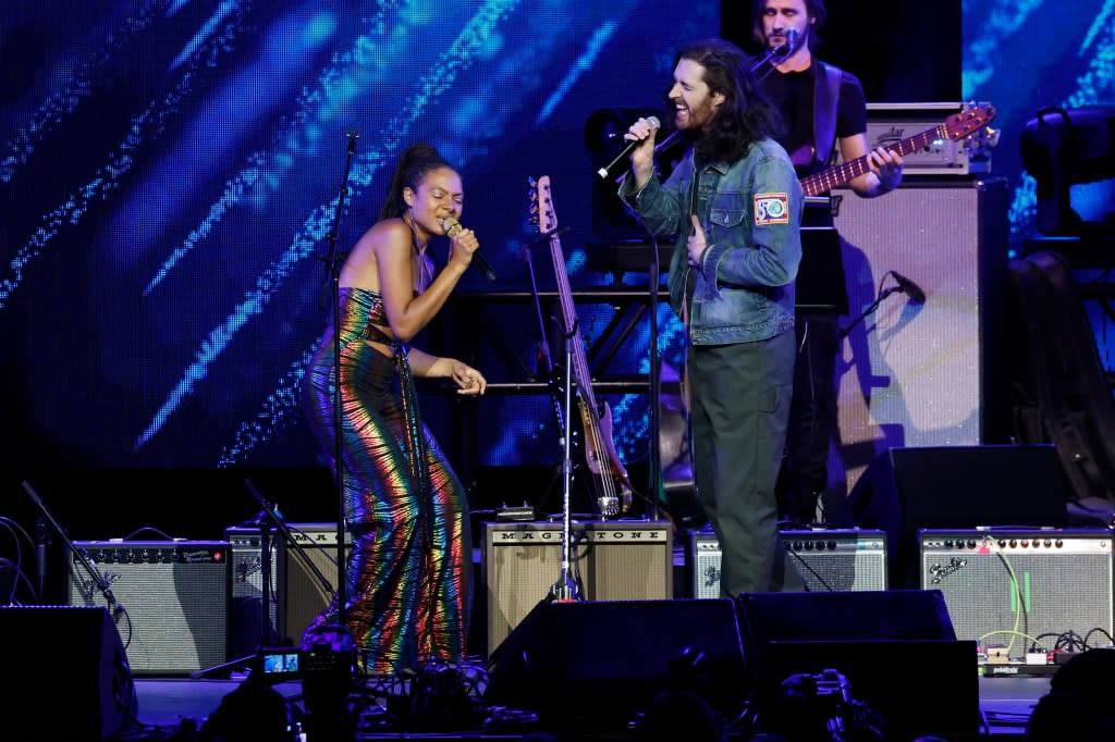 NASHVILLE, TENNESSEE - MARCH 20: Allison Russell and Hozier perform onstage during the Love Rising: Let Freedom Sing (and Dance) A Celebration Of Life, Liberty And The Pursuit Of Happiness show at Bridgestone Arena on March 20, 2023 in Nashville, Tennessee. (Photo by Jason Kempin/Getty Images)