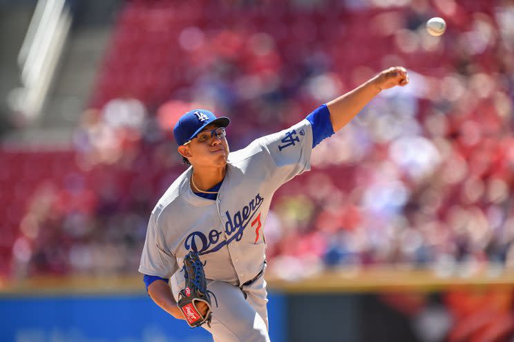 CINCINNATI, OH - AUGUST 21: Julio Urias #7 of the Los Angeles Dodgers pitches against the Cincinnati Reds at Great American Ball Park on August 21, 2016 in Cincinnati, Ohio. (Photo by Jamie Sabau/Getty Images)