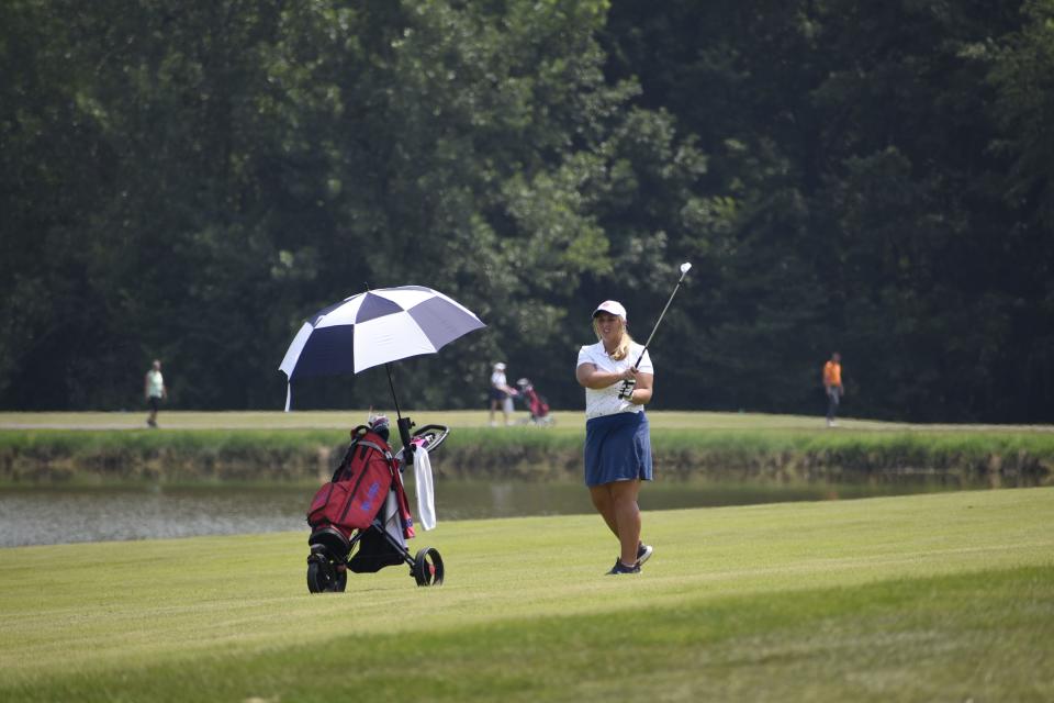 BNL's Kenley Craig whacks an iron shot out of the fairway at Country Oaks during the Washington Invitational. The Stars return there Saturday for the Washington Regional.