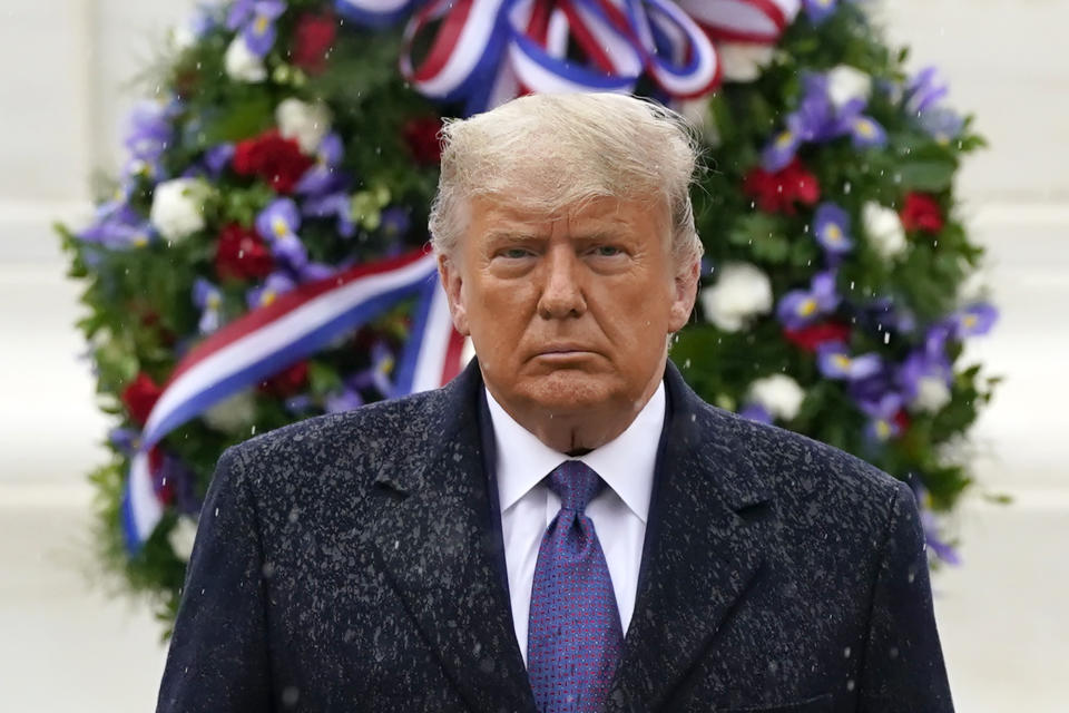 President Donald Trump participates in a Veterans Day wreath laying ceremony at the Tomb of the Unknown Soldier at Arlington National Cemetery in Arlington, Va., Wednesday, Nov. 11, 2020. (AP Photo/Patrick Semansky)