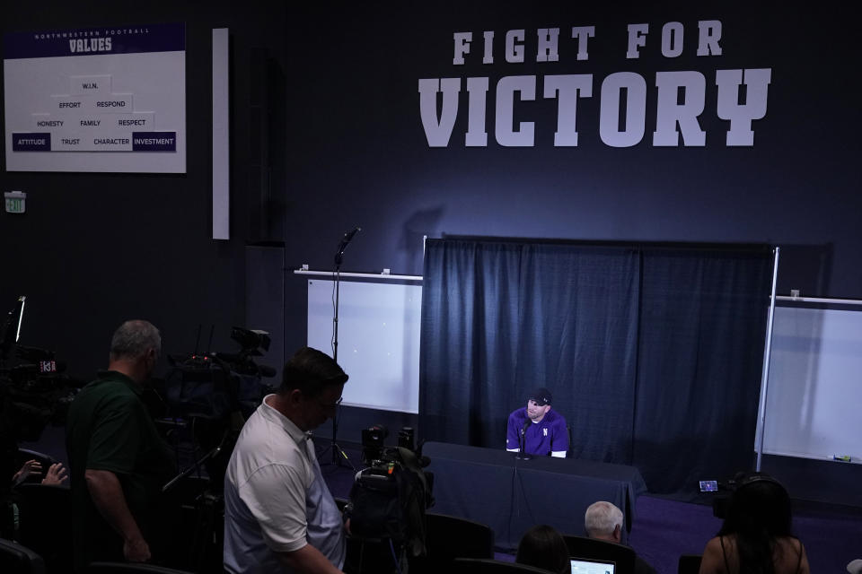 Northwestern interim head coach David Braun listens to a question during a news conference at Walter Athletics Center in Evanston, Ill., Wednesday, Aug. 9, 2023. (AP Photo/Nam Y. Huh)