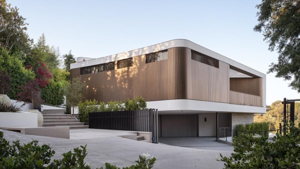 The three-level home overlooks the fourth green of the Bel-Air Country Club’s golf course. - Credit: Mike Kelley