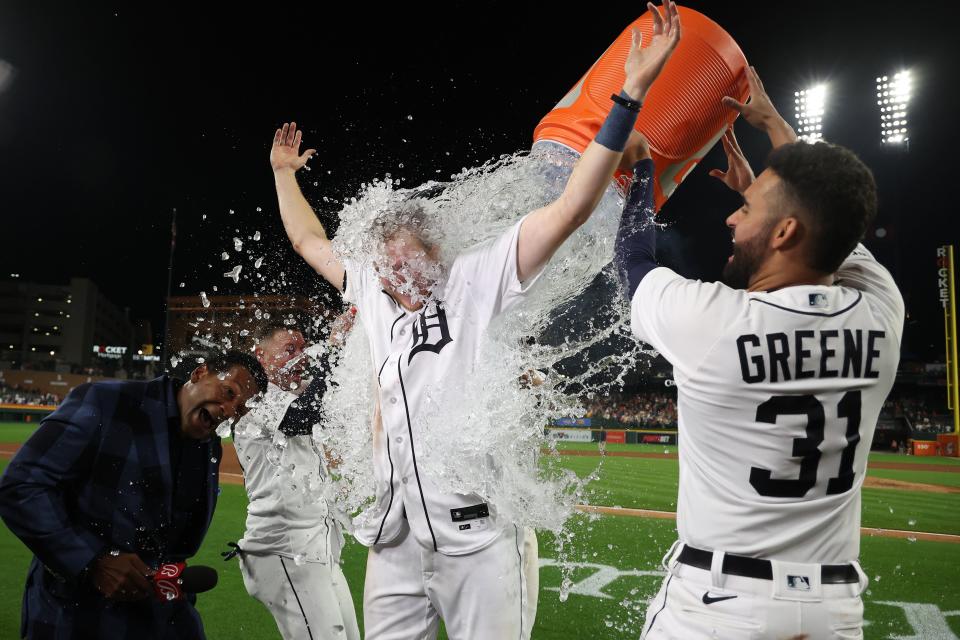 Tigers center fielder Parker Meadows takes a Gatorade dump from Riley Greene after his walk-off, three-run home run in the Tigers' 4-1 win over the Astros at Comerica Park on Friday, Aug. 25, 2023.