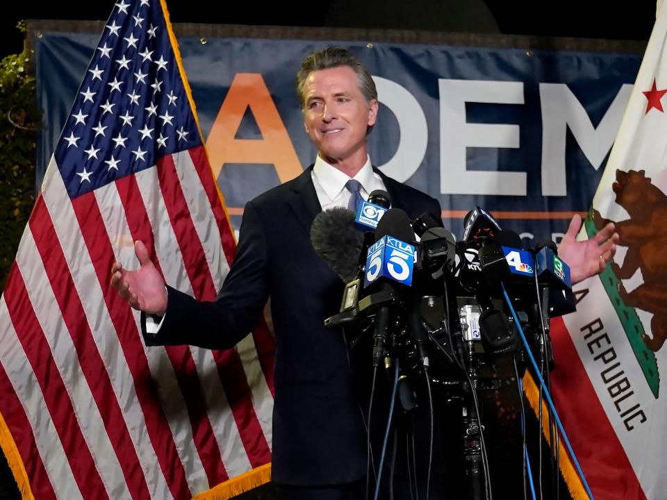 Gov. Gavin Newsom talks to reporters