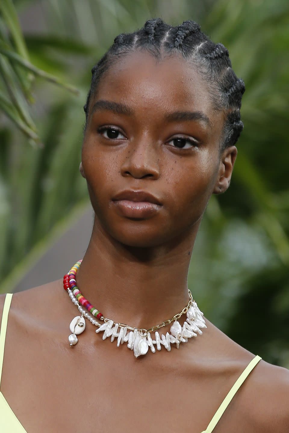 <p>Mix all your beaded jewels with pearls, shells, or medallion necklaces. </p><p><em>Jason Wu x Eliou</em></p>