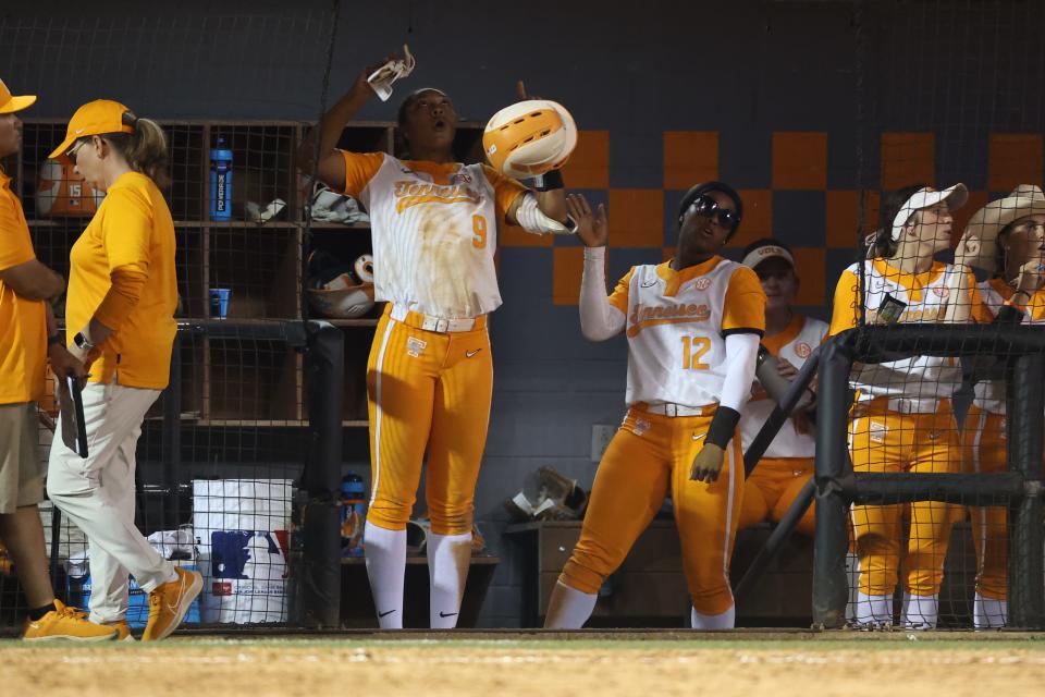 Tennessee outfielder Kiki Milloy (9) and Tennessee infielder Lair Beautae (12) dance in the dugout after the NCAA Regional Softball game against Campbell at the Sherri Parker Lee Stadium in Knoxville, TN on Friday, May 20, 2022.