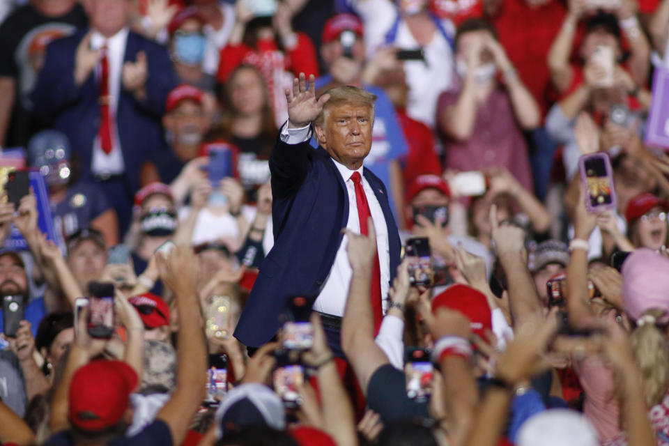 President Donald Trump waves to supporters after speaking at a campaign rally in Gastonia, N.C., Wednesday, Oct. 21, 2020. (AP Photo/Nell Redmond)