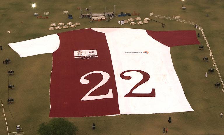 A handout picture from the media office of the Qatar 2022 bid shows an aerial picture of the largest jersey in the world in Doha on November 24, 2010