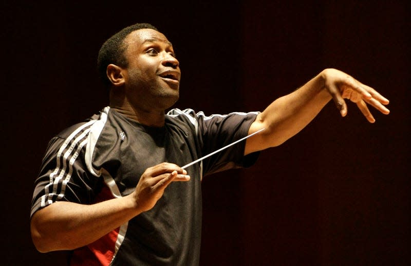 Conductor Kwame Ryan, who will lead the Houston Symphony April 3, 5, 6, rehearses with the orchestra at Jones Hall, Tuesday, April 1, 2008, in Houston. - Photo: Karen Warren (Getty Images)