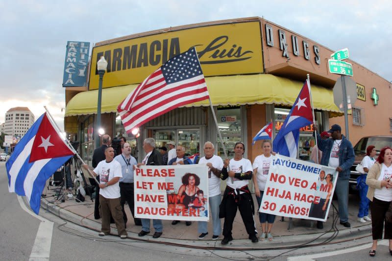 Members of the South Florida Cuban community celebrate the resignation of Cuban President Fidel Castro at Versailles Restaurant in Miami on February 19, 2008. File Photo by Chris Gordon/UPI