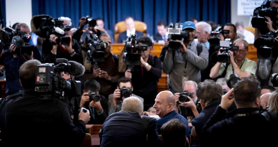 U.S. Ambassador to the European Union Gordon Sondland arrives to testify before the House Intelligence Committee on Capitol Hill in Washington, Wednesday, Nov. 20, 2019, during a public impeachment hearing of President Donald Trump's efforts to tie U.S. aid for Ukraine to investigations of his political opponents. (Doug Mills/Pool Photo via AP)