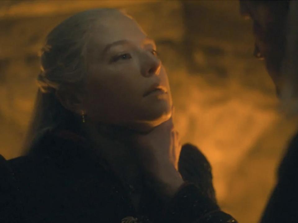 Emma D'Arcy as Rhaenyra Targaryen being choked by Matt Smith as Daemon Targaryen.