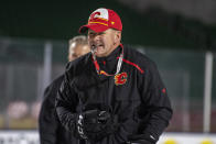 FILE - In this Oct. 25, 2019, file photo, Calgary Flames coach Bill Peters watches practice in Regina, Saskatchewan, ahead of the NHL Heritage Classic outdoor hockey game against the Winnipeg Jets. Calgary Flames general manager Brad Treliving said the team is looking into an accusation that head coach Bill Peters directed racial slurs toward a Nigerian-born hockey player a decade ago in the minor leagues, then arranged for the player’s demotion when he complained. Akim Aliu tweeted Monday, Nov. 25, 2019, that Peters “dropped the N bomb several times towards me in the dressing room in my rookie year because he didn’t like my choice of music.” (Liam Richards/The Canadian Press via AP, File)