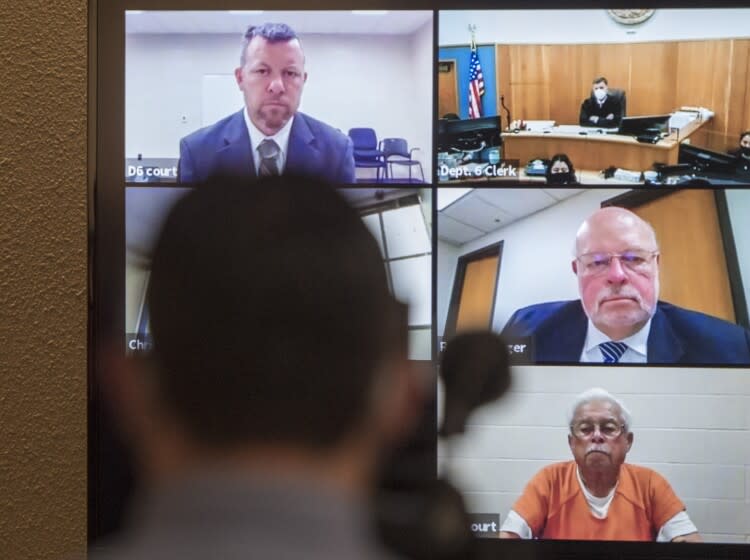 FILE - In this April 15, 2021, file photo defendants Paul Flores, top left, and his father, Ruben Flores, bottom right, appear via video conference during their arraignment in San Luis Obispo Superior Court in San Luis Obispo, Calif. The father and son were arrested in connection with the 1996 disappearance of Kristin Smart, a college student at California Polytechnic University San Luis Obispo. Paul Flores is charged with murder and his father, Ruben Flores, is charged as an accomplice for allegedly helping him bury her body. The two have pleaded not guilty. San Luis Obispo prosecutors say Paul Flores killed Smart while trying to rape her in his dorm room in May 1996 when they were freshmen students. The trial has been moved to Monterey County Superior Court in Salinas for Monday, July 18, 2022. (AP Photo/Nic Coury, File)