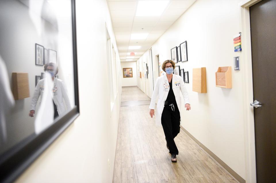 Dr. Kim Fortner walks down a hallway in the High Risk Obstetrics Unit in the University of Tennessee Medical Center. Fortner has treated pregnant patients suffering from COVID-19, and says their fear is palpable.