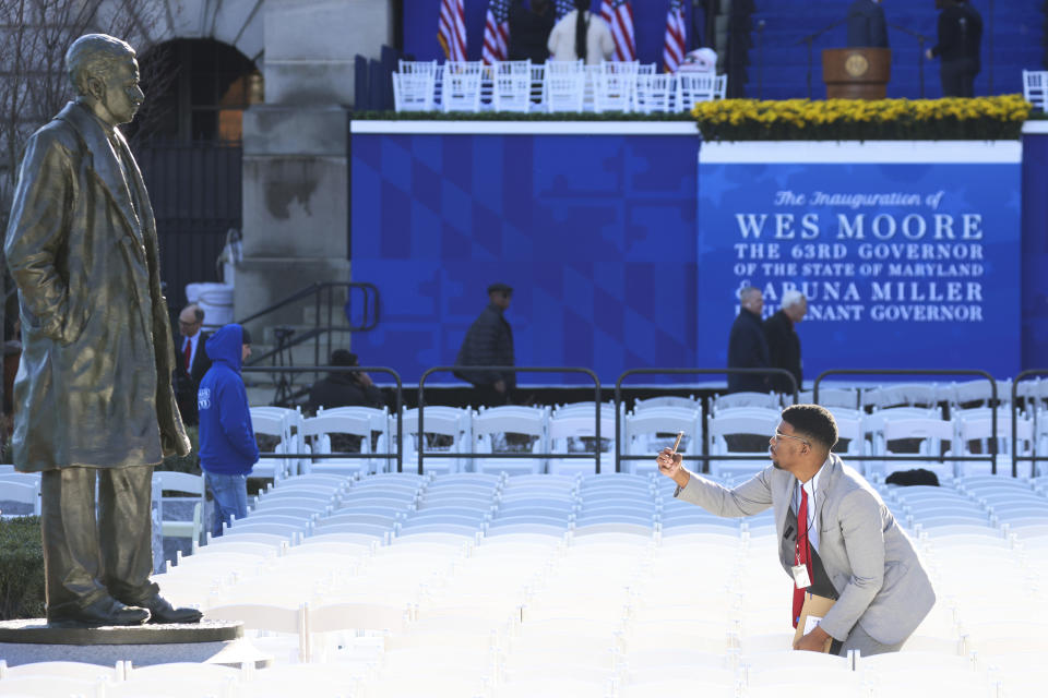 A person photographs a statue of Thurgood Marshall on Lawyer's Mall prior to Maryland Gov. Wes Moore's inauguration, Wednesday, Jan. 18, 2023, in Annapolis, Md. (AP Photo/Julia Nikhinson)