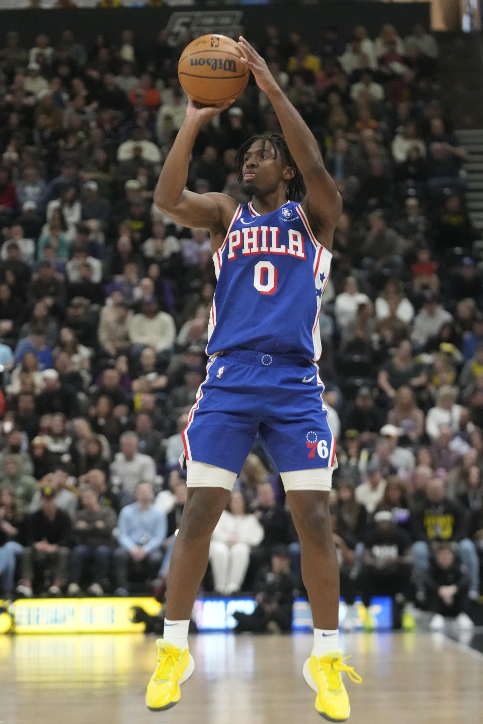 Philadelphia 76ers guard Tyrese Maxey (0) shoots against the Utah Jazz during the first half of an NBA basketball game Thursday, Feb. 1, 2024, in Salt Lake City. (AP Photo/Rick Bowmer)
