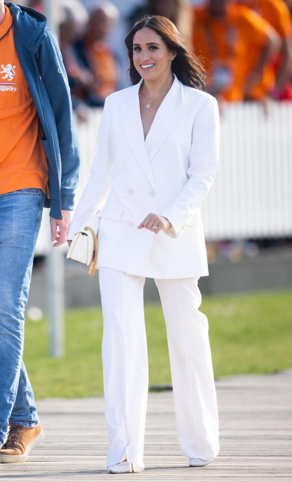 Meghan Markle at the 2020 Invictus Games in a white double breasted suit