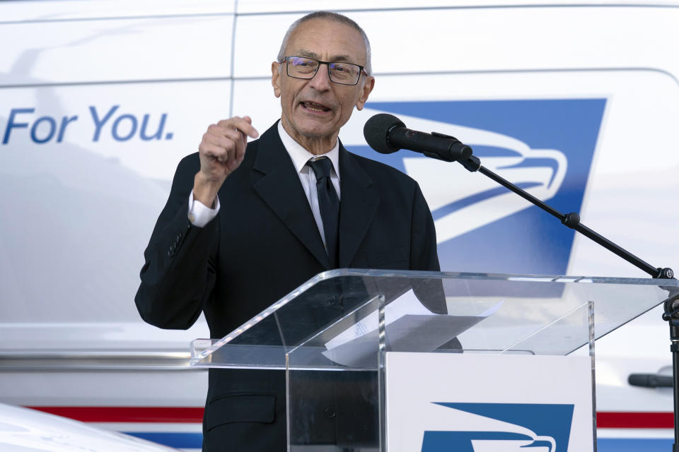 Senior Advisor to the President for Clean Energy Innovation and Implementation John Podesta, speaks during a news conference announcing the Postal Service will sharply increase the number of electric-powered delivery trucks in its fleet and will go all-electric for new purchases starting in 2026. (AP Photo/Jose Luis Magana)
