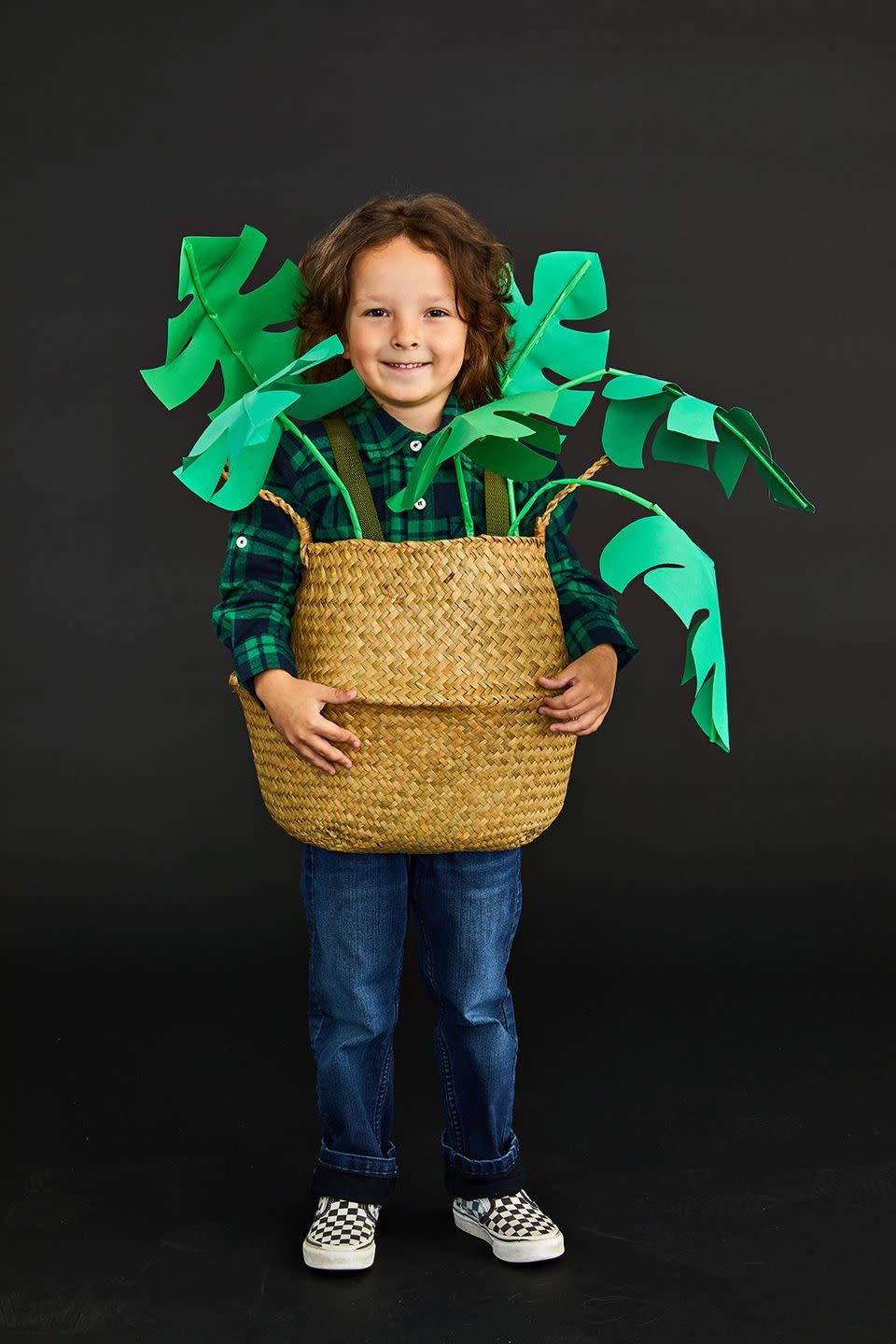 <p>Another good ones for kids? This adorable plant look! To make, cut a hole in the bottom of the basket wide enough for hips and legs to fit through comfortably. Download leaf template and trace onto green paper. Trim and fold in half. Cut varying lengths of wire. Create stems by threading with green straws, dabbing hot glue as you thread to keep straws in place. Hot glue leafs to the ends of the stems. Hot glue the stems to the inside of the basket, avoiding the sides. You can reinforce these with duct tape if necessary once dry. Cut 2 lengths of green ribbon to use as shoulder straps. Attach to the inside front and back of the basket with velcro tape or safety pins. Dress in shades of green and slide the basket over your head, with the straps resting on your shoulders. Bend stems around you to create a natural look.</p><p><a class="link " href="https://hmg-prod.s3.amazonaws.com/files/gh-halloween-leaftemplate-1660140892.pdf?tag=syn-yahoo-20&ascsubtag=%5Bartid%7C10055.g.2750%5Bsrc%7Cyahoo-us" rel="nofollow noopener" target="_blank" data-ylk="slk:GET TEMPLATE;elm:context_link;itc:0;sec:content-canvas">GET TEMPLATE</a></p>