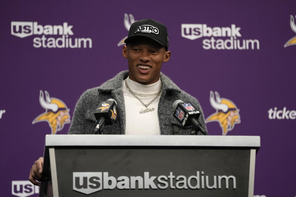 Minnesota Vikings quarterback Joshua Dobbs answers questions during a press conference after an NFL football game against the New Orleans Saints, Sunday, Nov. 12, 2023, in Minneapolis. The Vikings won 27-19. (AP Photo/Abbie Parr)