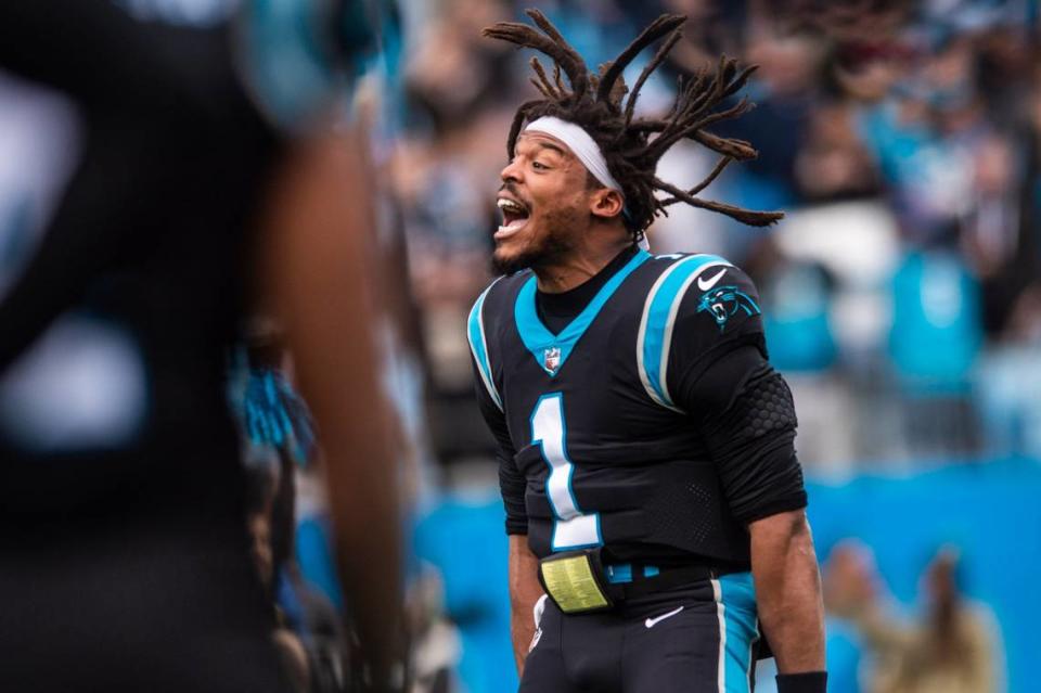 Panthers quarterback Cam Newton gets hype during introductions before the game against the Washington Football Team at Bank of America Stadium on Sunday, November 21, 2021 in Charlotte, NC.