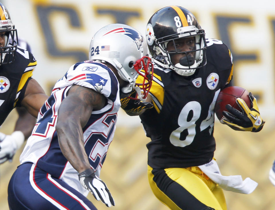 Pittsburgh Steelers'  Antonio Brown (84) returns the opening kickoff as New England Patriots  Kyle Arrington (24) pursues in the first quarter of the NFL football game on Sunday, Oct. 30, 2011, in Pittsburgh. (AP Photo/Keith Srakocic)