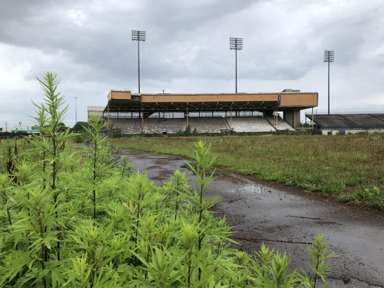 Cooper Stadium on West Mound Street in Columbus' Franklinton neighborhood has sat idle since the last Clippers baseball game was played there in 2008. This Dispatch file photo is from July 2021. A plan unveiled Monday would convert the site to a mixed-use development with apartments, retail space, a potential amphitheater using part of the old grandstand.