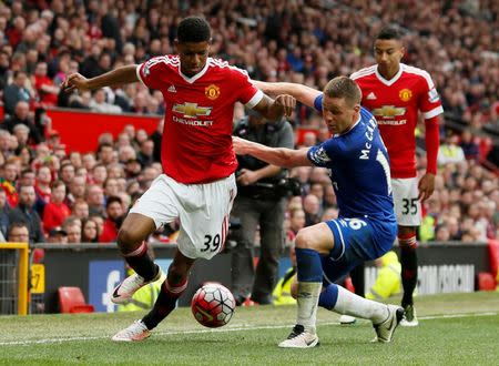 Football Soccer - Manchester United v Everton - Barclays Premier League - Old Trafford - 3/4/16 Manchester United's Marcus Rashford in action with Everton's James McCarthy Action Images via Reuters / Jason Cairnduff Livepic EDITORIAL USE ONLY.