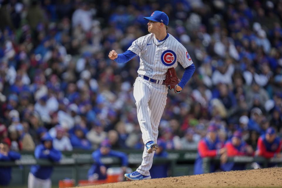 Chicago Cubs starting pitcher Keegan Thompson walks Milwaukee Brewers third baseman Brian Anderson during the seventh inning of a baseball game Thursday, March 30, 2023, in Chicago. (AP Photo/Erin Hooley)