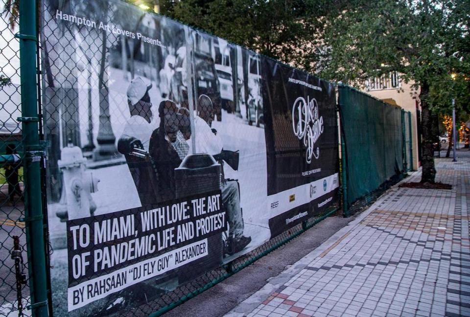 A banner advertises the exhibit “To Miami, with Love: Pandemic Life and Protest,” by photographer Rahsaan Alexander, at the Historic Ward Rooming House Gallery in the heart of Miami’s Overtown neighborhood in April.