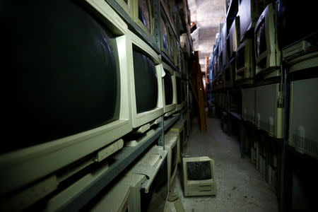 Apple computers sit on the shelves in the storage of Austrian Apple computer collector Roland Borsky in Korneuburg, Austria September 27, 2018. REUTERS/Leonhard Foeger