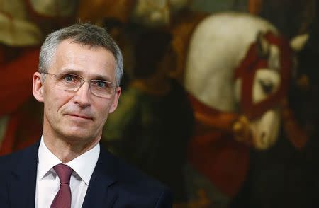 NATO Secretary-General Jens Stoltenberg looks on during a joint news conference with Italian Prime Minister Matteo Renzi at the end of a meeting at Chigi Palace in Rome February 26, 2015. REUTERS/Tony Gentile