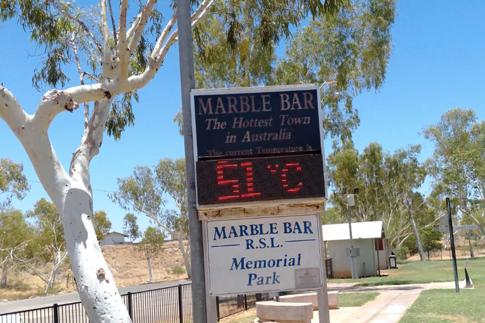 A temperature gauge showing a temperature of 51 degrees in Marble Bar in a local park.