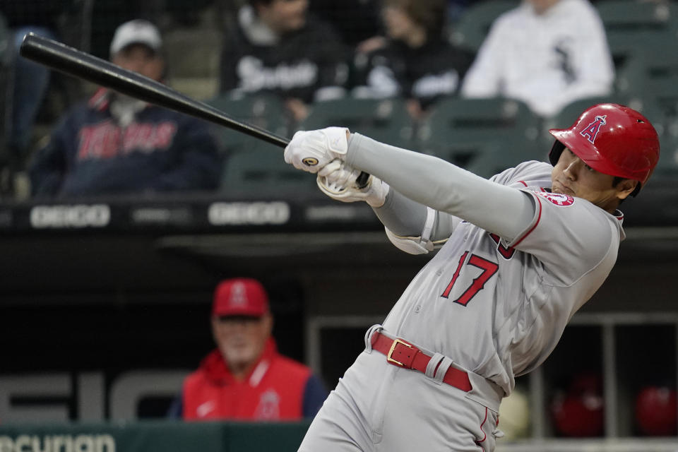 Los Angeles Angels' Shohei Ohtani, of Japan, hits a solo home run during the first inning of a baseball game against the Chicago White Sox in Chicago, Friday, April 29, 2022. (AP Photo/Nam Y. Huh)