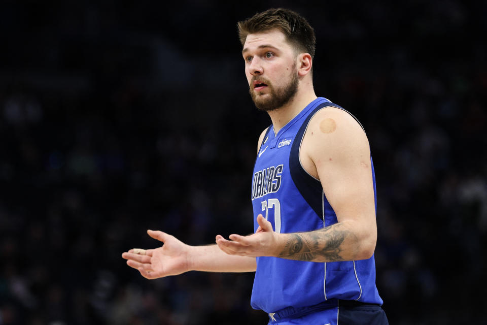 December 19, 2022; Minneapolis, Minnesota, USA. Dallas Mavericks guard Luka Doncic, 77, reacts after being ejected from the game during the third quarter against Minnesota his Timberwolves at his target center. Required credit: Matt Krohn-USA TODAY Sports