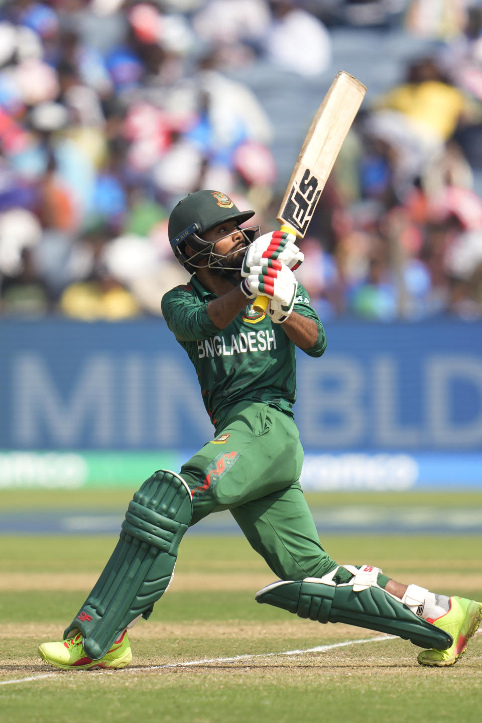 Bangladesh's Towhid Hridoy plays a shot during the ICC Men's Cricket World Cup match between Australia and Bangladesh in Pune, India, Saturday, Nov. 11, 2023. (AP Photo/Rafiq Maqbool)