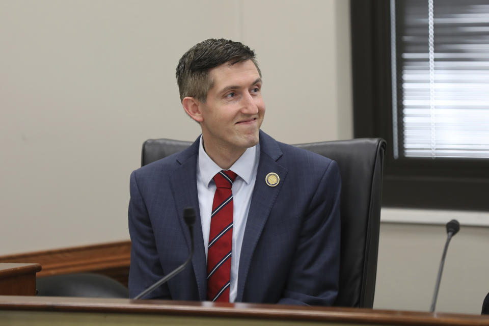 South Carolina Rep. Adam Morgan, R-Taylors, waits to speak on a bill that would limit the way certain topics could be taught in public schools during a conference committee meeting on Tuesday, May 7, 2024, in Columbia, South Carolina. (AP Photo/Jeffrey Collins)