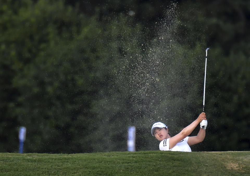 Sei Young Kim hits from the fairway on the 10th hole during Round 1 of 2021 KPMG Women's PGA Championship at Atlanta Athletic Club in Johns Creek, Ga., Thursday, June 24, 2021. (Hyosub Shin/Atlanta Journal-Constitution via AP)