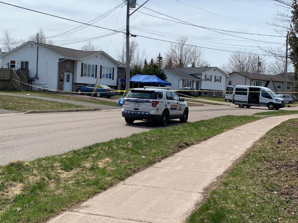 Police at the scene of a homicide on Logan Lane in Moncton on April 25, 2022.