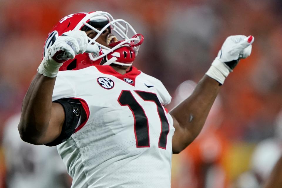 Georgia linebacker Nakobe Dean celebrates after sacking Clemson quarterback D.J. Uiagalelei during the first half of an NCAA college football game Saturday, Sept. 4, 2021, in Charlotte, N.C.