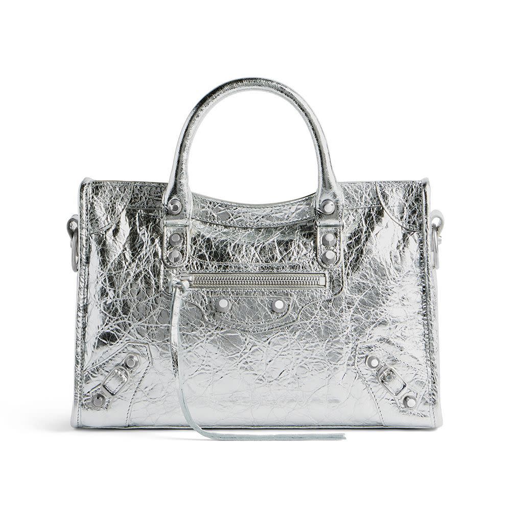 <p><a href="https://go.redirectingat.com?id=74968X1596630&url=https%3A%2F%2Fwww.balenciaga.com%2Fen-us%2Fle-city-small-bag-metallized-silver-7977892AA9R8122.html&sref=https%3A%2F%2Fwww.elle.com%2Ffashion%2Faccessories%2Fa60400720%2Fbalenciaga-city-bag-relaunch%2F" rel="nofollow noopener" target="_blank" data-ylk="slk:Shop Now;elm:context_link;itc:0;sec:content-canvas" class="link rapid-noclick-resp">Shop Now</a></p><p>Le City Small Bag Metallized in Silver</p><p>balenciaga.com</p><p>$2390.00</p>