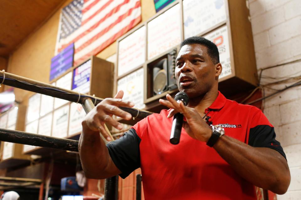 Republican Senate candidate Herschel Walker speaks to supporters at the Northeast Georgia Livestock Barn in Athens, Ga., on Wednesday, July 20, 2022. Walker spoke about gas prices and the November election. 